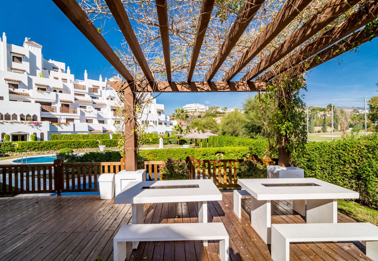 Piscine pour 2 chambres appartement de vacances avec piscine et terrasse à Estepona