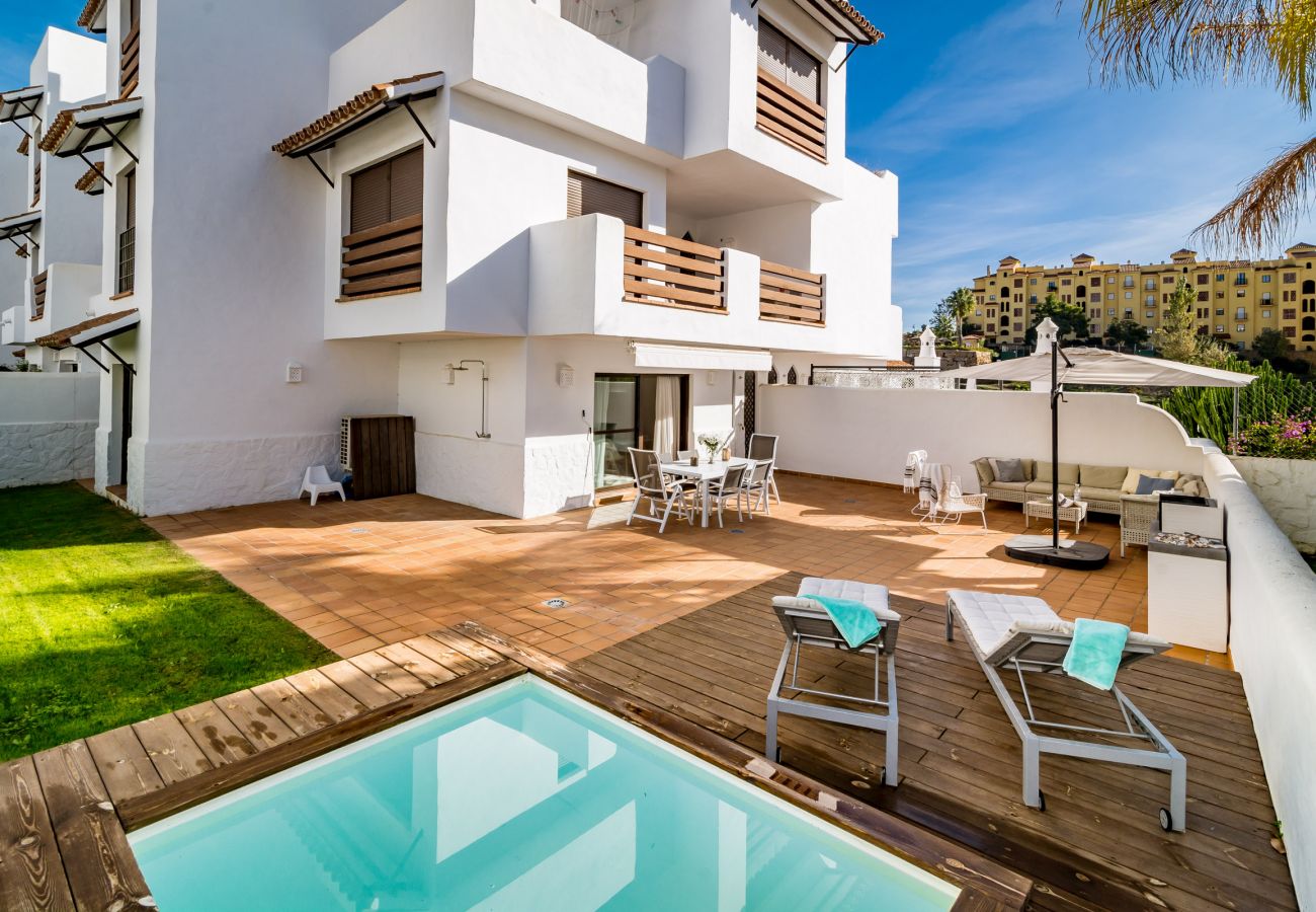 Holiday apartment in Golf hills Estepona. Large terrace with small swimming pool near golf and beach
